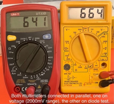 Both multimeters connected in parallel, one on<br />voltage (2000mV range), the other on diode test.